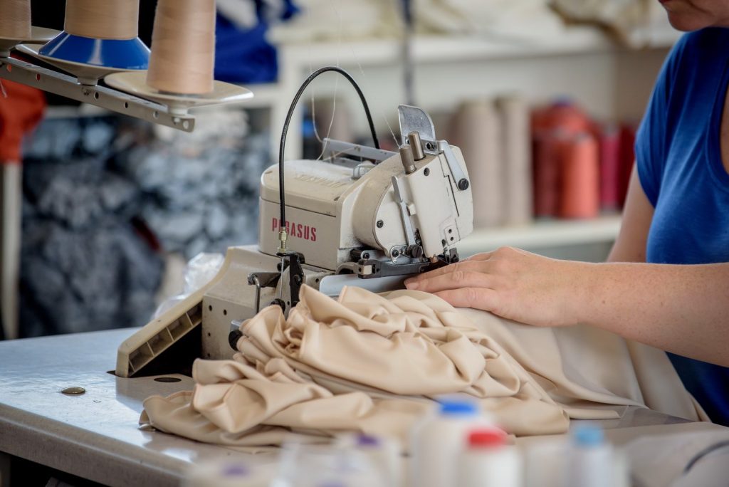 Sewing linen in the family workshop in Heraklion