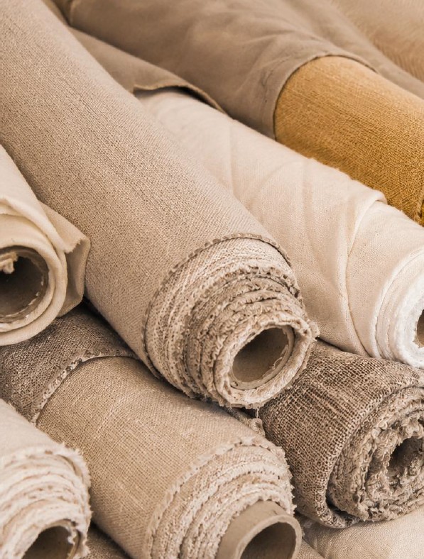Rolls of natural linen fabric